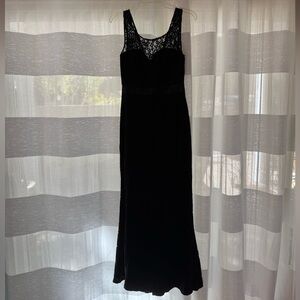 Black lace sleeveless floor length dress. Mermaid bottom. Size medium runs small